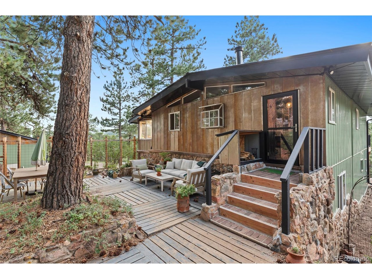 Photo of 22937 Pawnee Rd Indian Hills CO 80454