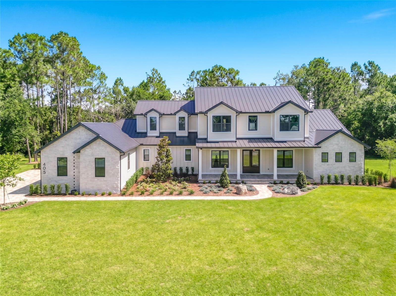 Photo of 405 LONG AND WINDING ROAD HOWEY IN THE HILLS FL 34737