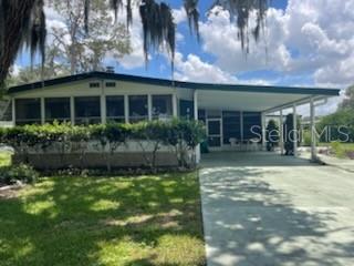 Photo of 74 N BOBWHITE ROAD WILDWOOD FL 34785
