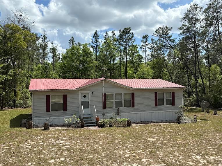 Photo of 109 GREENWOOD ROAD FLORAHOME FL 32140