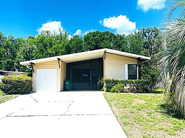 Photo of 603 ROBIN LANE WILDWOOD FL 34785