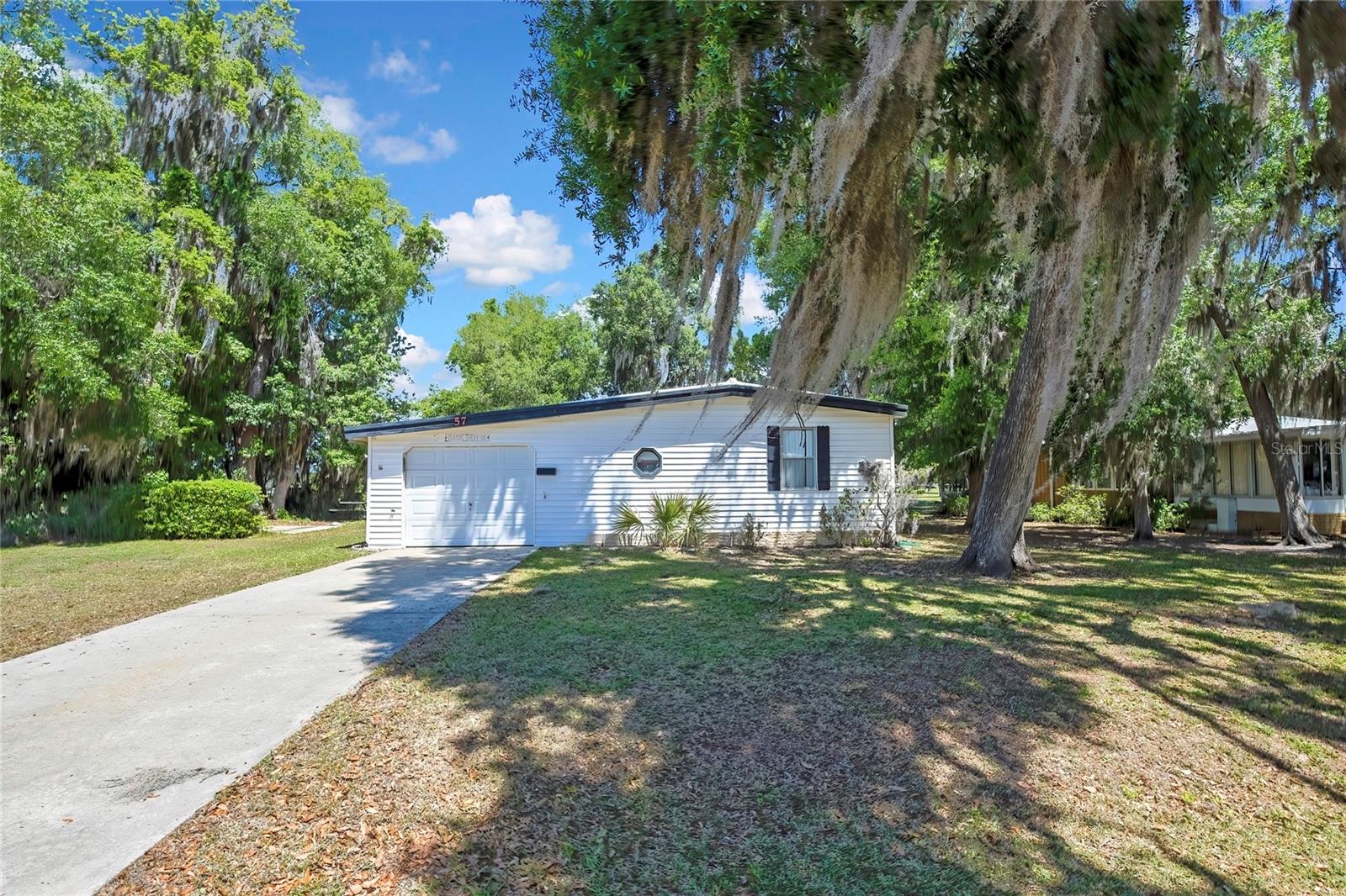Photo of 57 N BOBWHITE ROAD WILDWOOD FL 34785