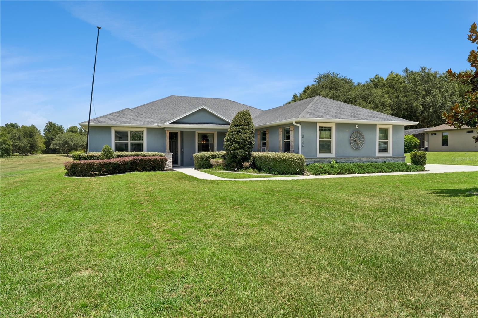 Photo of 18145 GREAT BLUE HERON DRIVE GROVELAND FL 34736