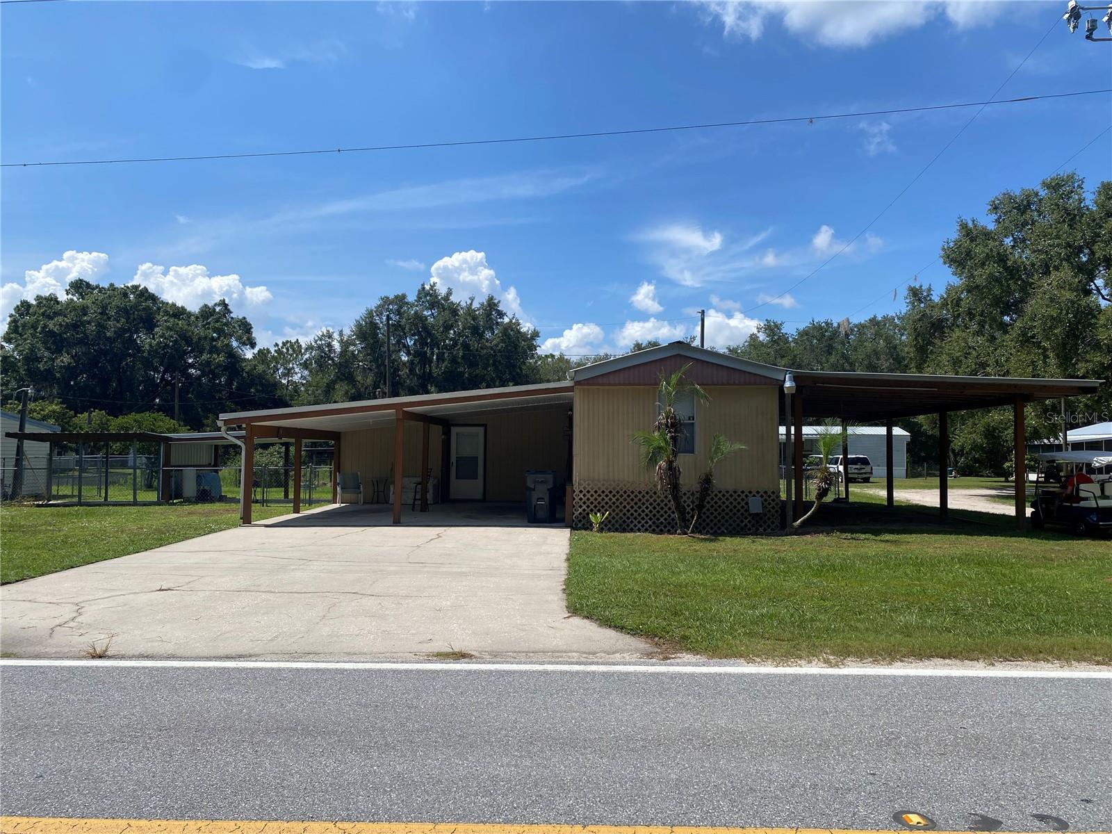 Photo of 13601 LAKE HATCHINEHA ROAD HAINES CITY FL 33844