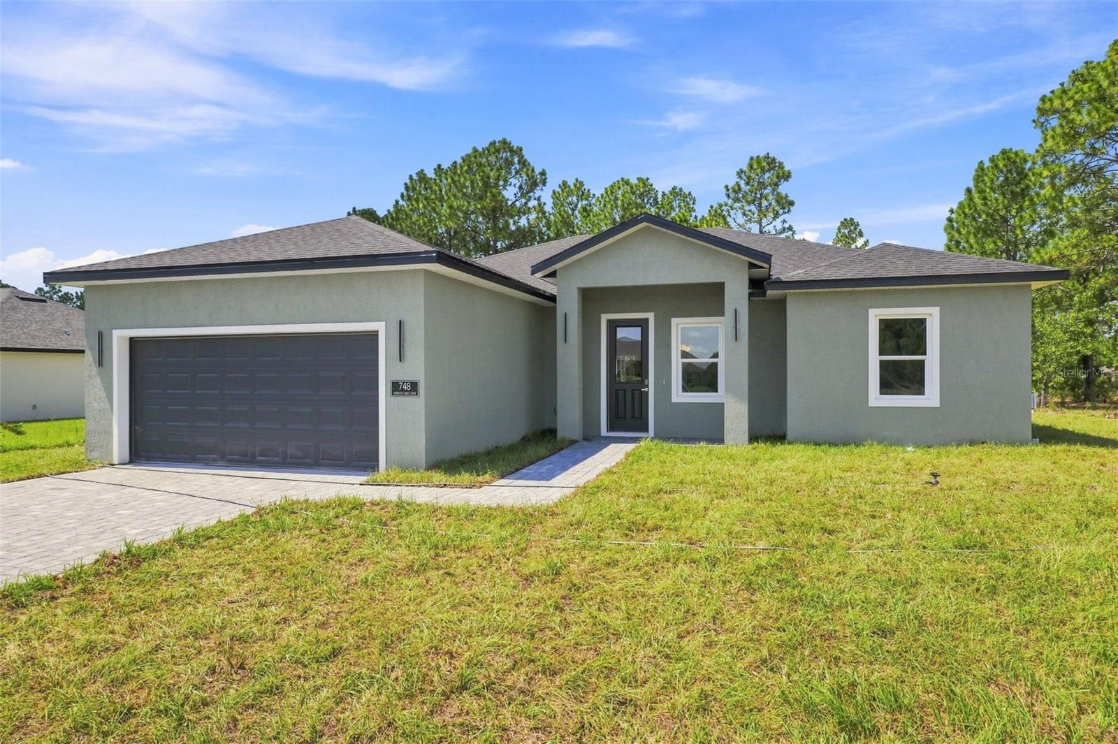 Photo of 748 MARION OAKS MANOR OCALA FL 34473