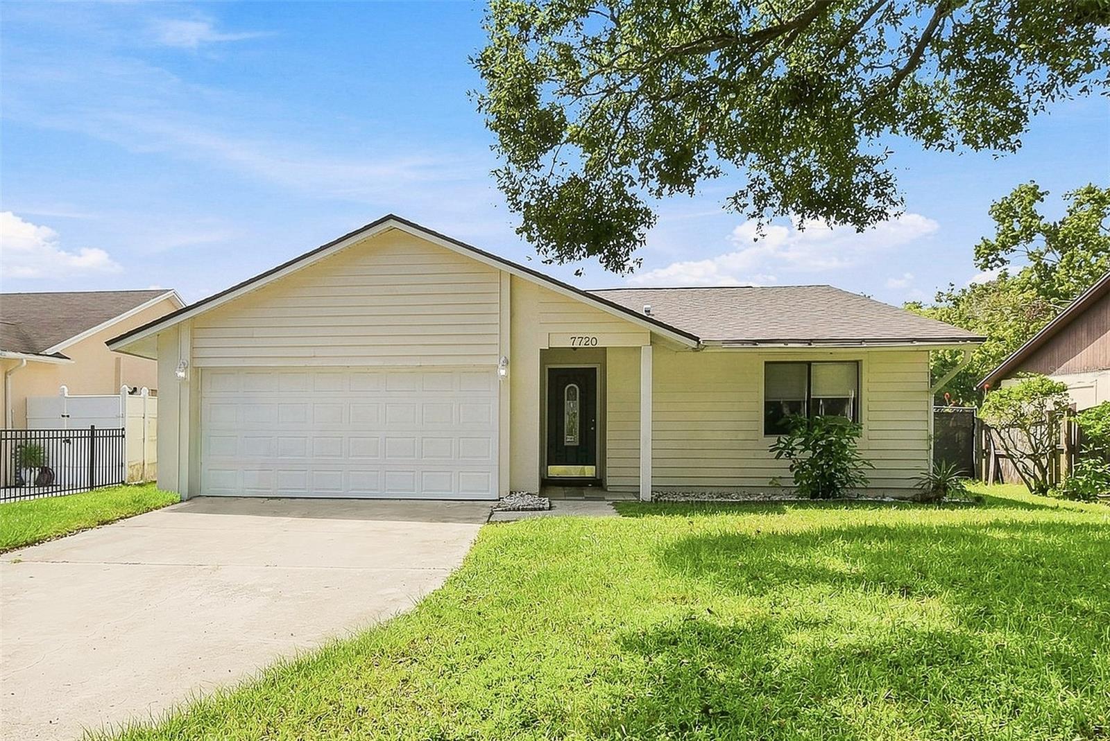 Photo of 7720 LAKESIDE WOODS DRIVE ORLANDO FL 32810
