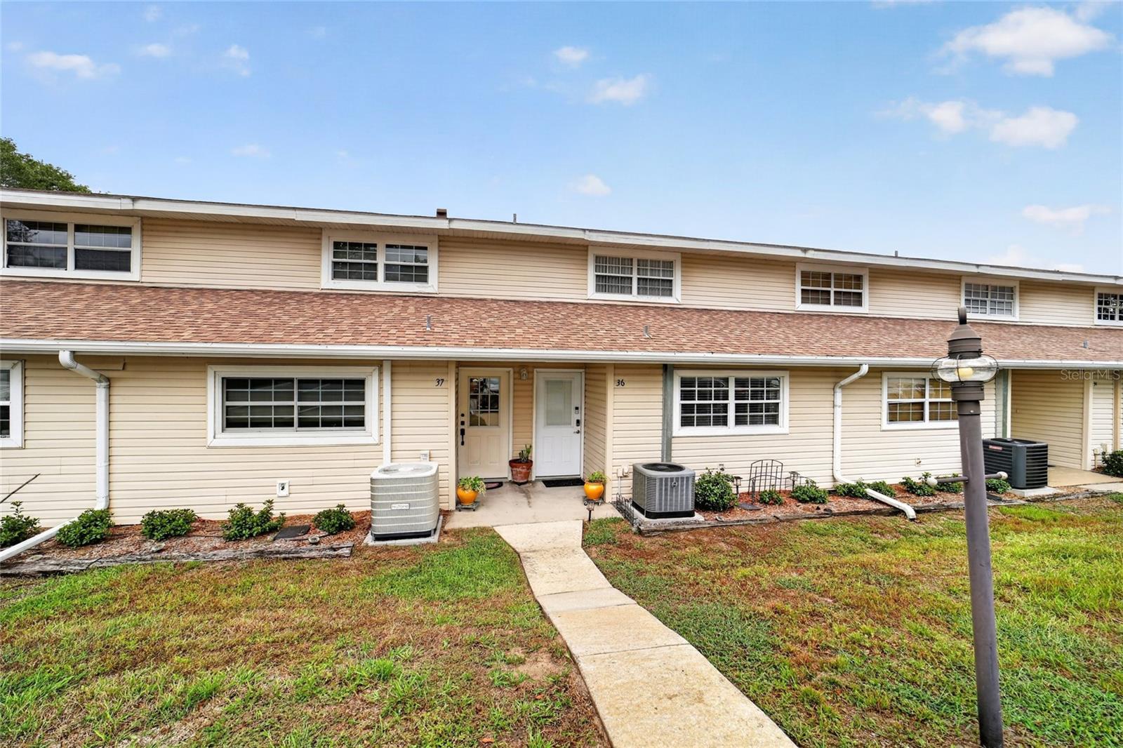 Photo of 11001 SE SUNSET HARBOR ROAD #E36 SUMMERFIELD FL 34491