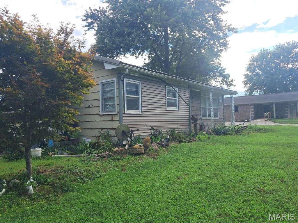 Photo of 209 E Sunset Drive Hale MO 64643